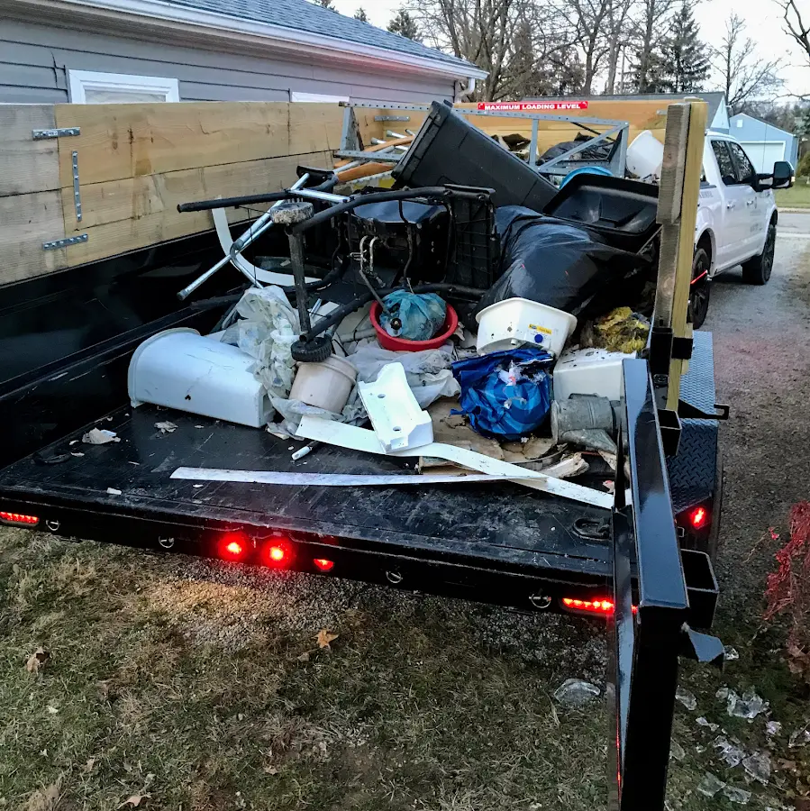 Roll-off dumpster delivered to a residential driveway in Hernando